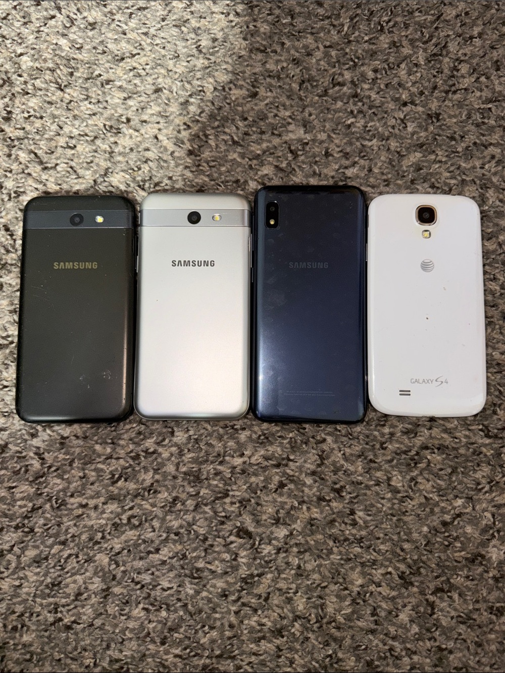 Samsung Lot of Four Phones - Black, Silver, Navy, White